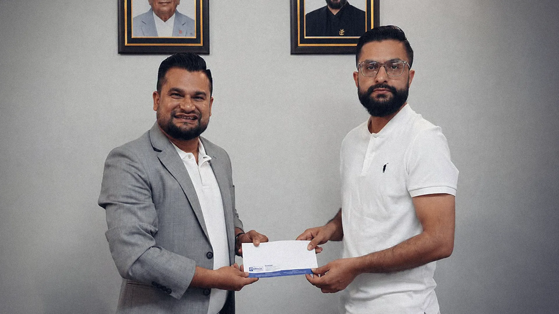 25 Lakh Check: Controversial Businessman Makes Education Minister A 'Porter'!